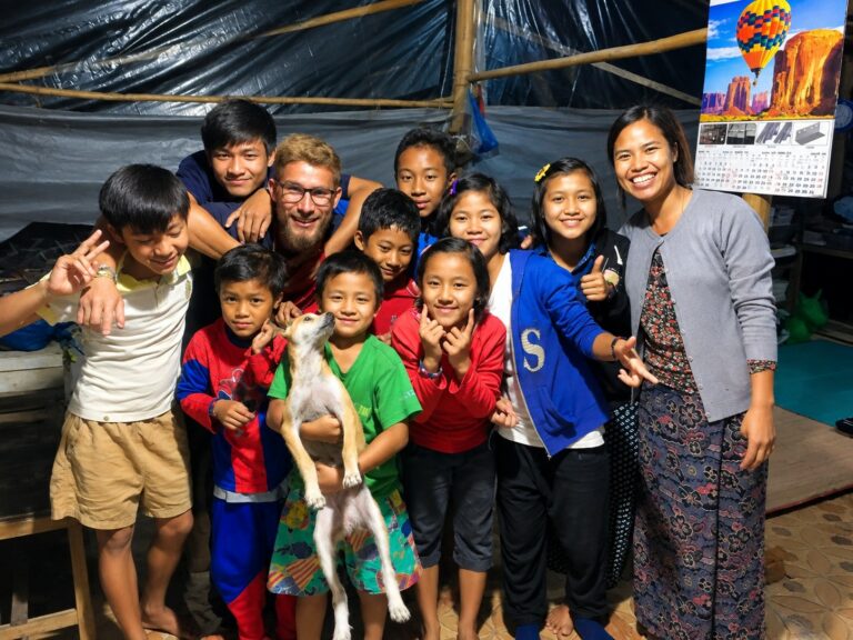 Children and volunteers gathered at the orphanage in Myanmar